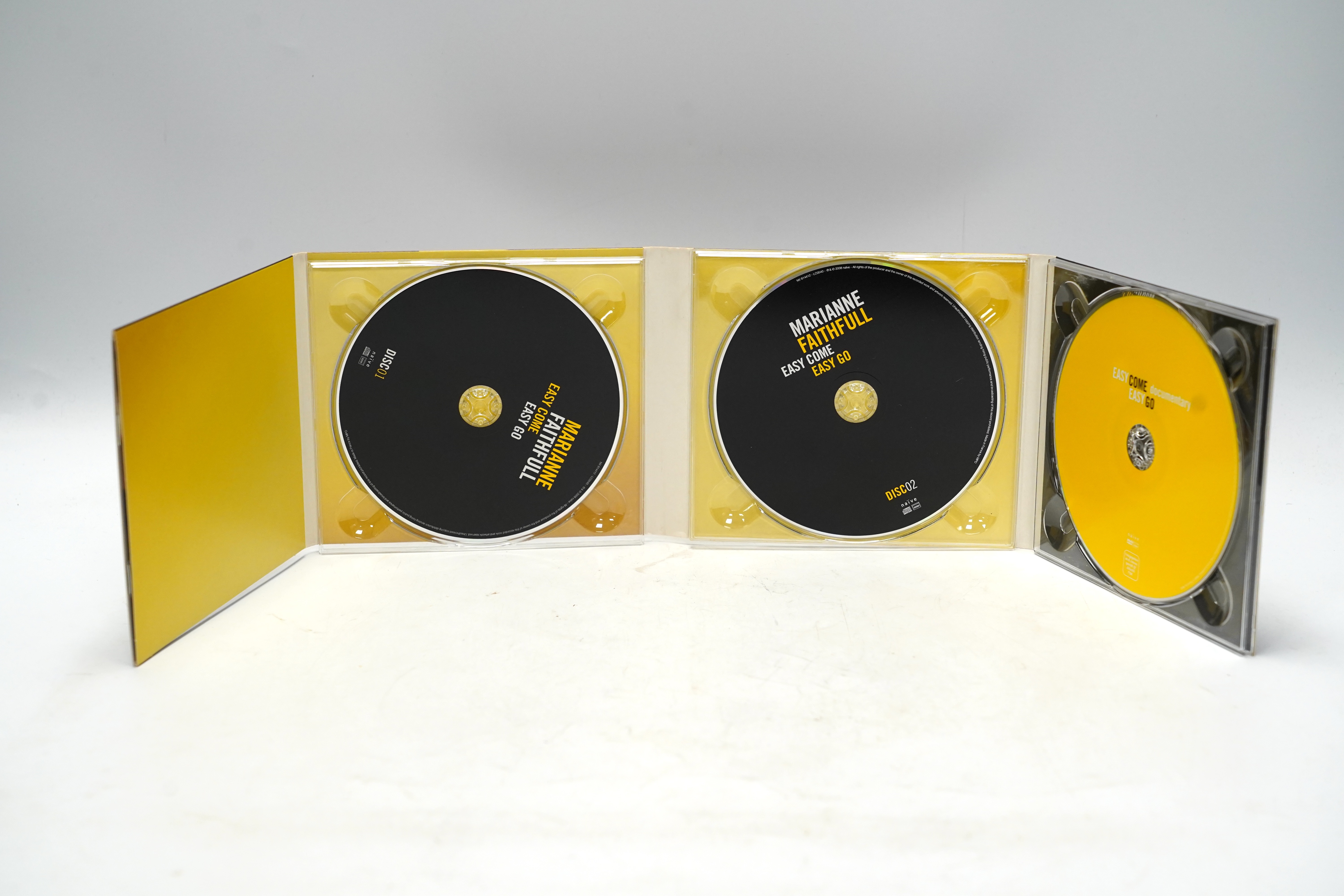 A Marianne Faithful autographed CD; ‘Easy Come Easy Go’ with dedication to the front cover to Brian Matthew, together with a late 1960s black and white press photograph of her in a BBC studio, credited to Axel Poignant t
